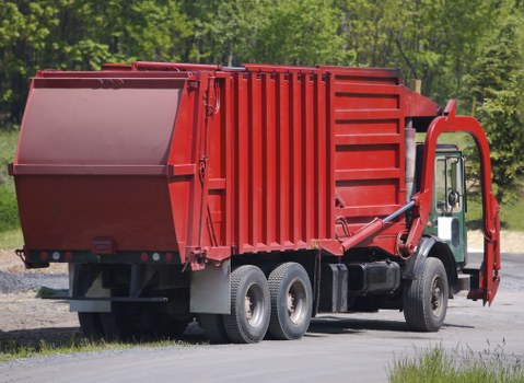 Low-carbon van used for skip deliveries and collections